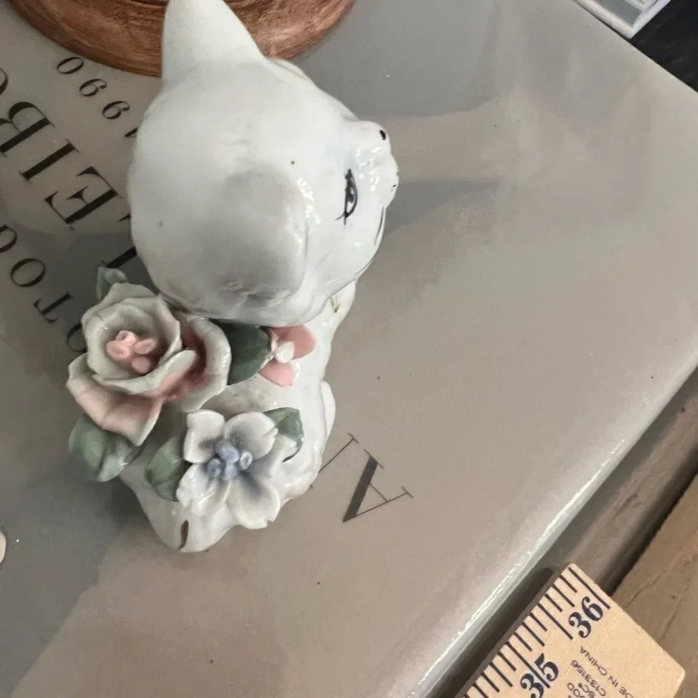 Set of two vintage small ceramic white and floral cats.
